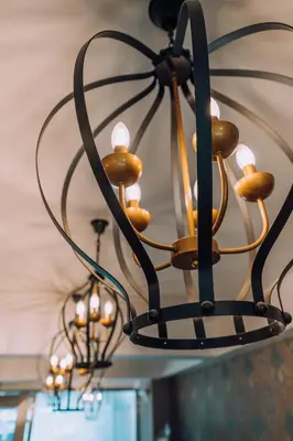 a chandelier hanging from the ceiling of a room at Lima Central Design Hotel Spa & Club in Lima