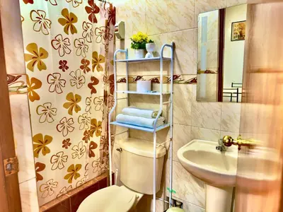 a bathroom with a toilet and a sink at 100- departamento céntrico en chorrillos in Lima