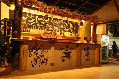 a bar with graffiti on the wall of a building at Vertikal lodge in Santa Teresa