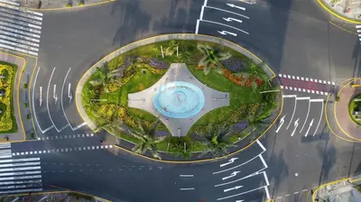 an aerial view of a building with a circle at ✶ Nazca Penthouse ✶ 3-stories LUXURY Rooftop Pool in Lima