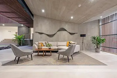 a living room with a couch and chairs and a table at ✶ Nazca Penthouse ✶ 3-stories LUXURY Rooftop Pool in Lima