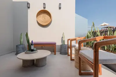a room with chairs and a table and plants at ✶ Pisac Penthouse ✶ 3-stories LUXURY Rooftop Pool in Lima