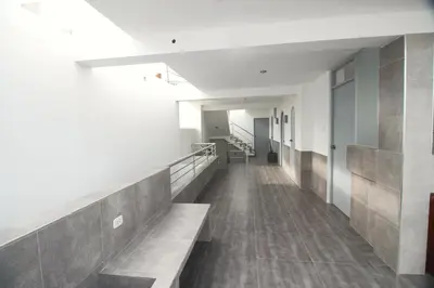 a hallway of a building with a long corridor at Mar Azul in Paracas