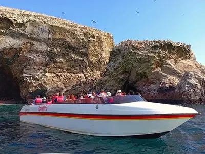 a group of people on a boat in the water at Mar Azul in Paracas