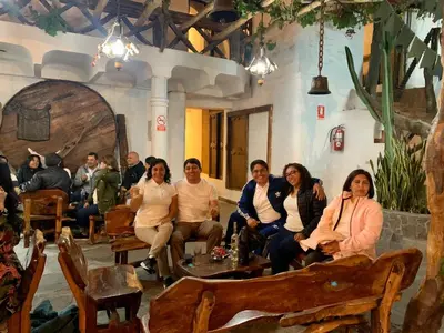 a group of people sitting in a room at Hotel Sol de Ica in Ica