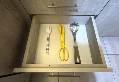 a wooden box with utensils sitting on a table at Loft Central Miraflores in Lima