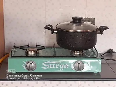 a pot sitting on top of a stove at 301 Comfy Apt WiFi kitchen SmartTV Central at Callao in Lima
