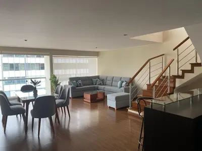 a living room with a couch and a table at Miraflores - Luxury Room in the Best Place in Lima