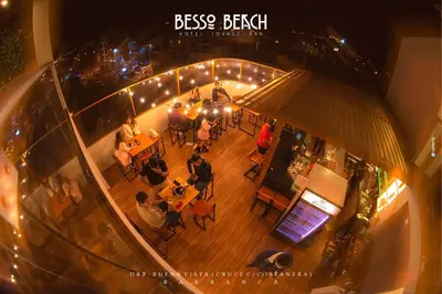 an overhead view of a restaurant with people sitting at tables at Besso Beach Hotel in Barranca