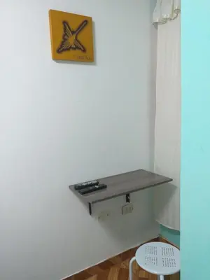 a shelf on a wall with a fish on it at Chakana Family Home 2 Lima Airport in Lima