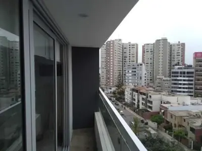 a view of a city from a balcony of a building at MLA apartments - Reducto 360 in Lima
