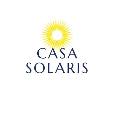a logo for a california company with a sunburst at Casa Solaris in Ica
