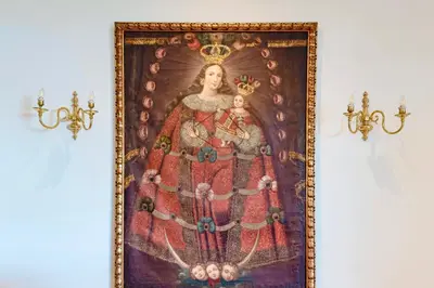 a painting of a woman in a crown on a wall at ✶ Maras Residence ✶ LUXURY Rooftop Pool & Grill in Lima