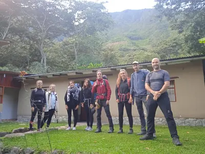 a group of people standing in front of a house at Lia B&B Lucmabamba in Sahuayacu