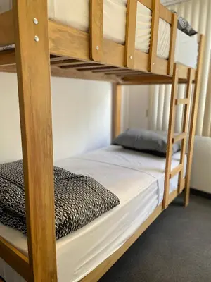 a couple of bunk beds in a room at Rainbow Hostel in Lima