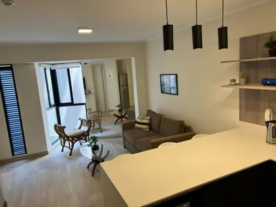 a living room with a couch and a table at BARRANCO Apartment Lima Peru in Lima