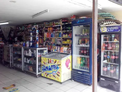 a store with a drink cooler in a store at Hostal Jovita in Lima