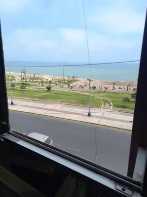 a view of a street from a window of a bus at Lugar encantador frente al mar con tina o jacuzzi in Lima