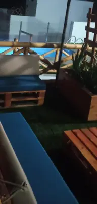 a table with a potted plant on top of it at Tranquilidad y Sol in Cieneguilla