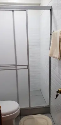 a shower with a glass door in a bathroom at Tilcafé B&B Mollepata in Mollepata