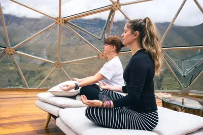 two women sitting in meditation in a gazebo at Stardome Spiritual Experience in Ollantaytambo