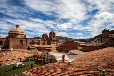 a view of an amphitheater with buildings and a sky at Hotel Santa Maria in Cusco