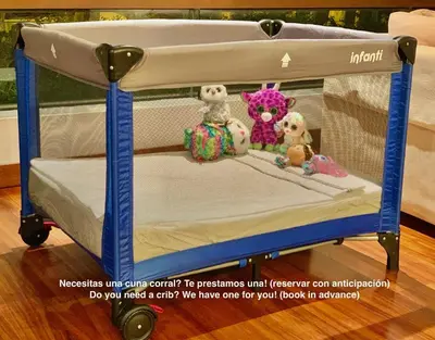 a baby crib with stuffed animals on it at ALU Apartments - Miraflores in Lima