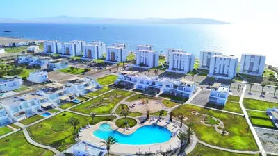 an aerial view of a resort near the ocean at Suite 1 Fila Vista Bahía Paracas- La Velas 601 T1 in Paracas