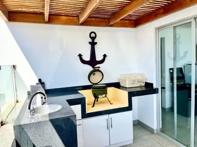 a bathroom with a sink and a mirror on the wall at Suite 1 Fila Vista Bahía Paracas- La Velas 601 T1 in Paracas