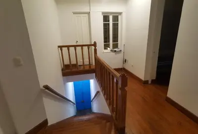 a stairway with a blue box in a room at La Casona Hospedaje in Lima