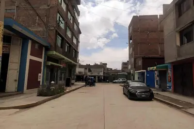 a car parked on a street in a city at Depawanka 1 departamento amoblado in Huancayo