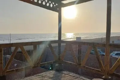 a view of the ocean from the balcony of a house at CASA PLAYA REFUGIO AZUL in Cerro Azul