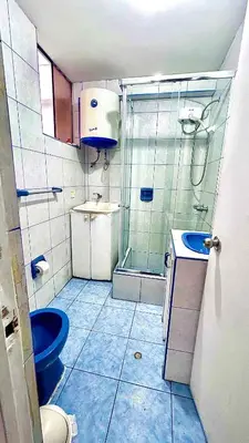a bathroom with a shower and a toilet and a sink at IV Hermosa Habitacion Privada en Miraflores City in Lima