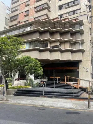 a building with stairs in front of a building at 15 Acogedor dpto de un ambiente en miraflores in Lima