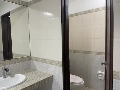 a bathroom with a toilet and a sink at 16 Dpto con inmejorable ubicación en Miraflores in Lima