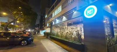 a car parked in front of a building with a store window at Private Cozy room with batroom in Miraflores in Lima