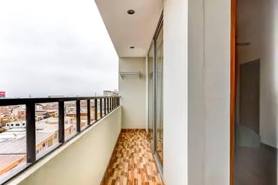 a room with a balcony with a view at Apartamentos Estela en Alameda colonial - 5km Aeropuerto Jorge Chávez in Lima