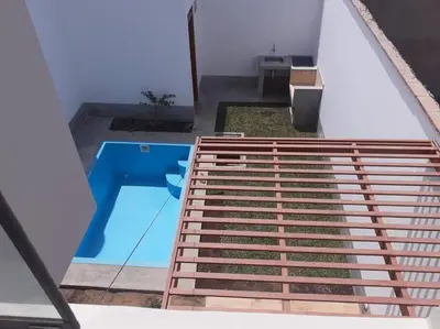 a view of a swimming pool from the top of a house at Hermosa Casa de Playa km 90.5 in Bujama Baja