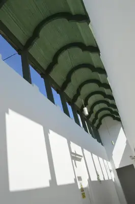 an empty building with a green ceiling at Collacocha B&B in Lima