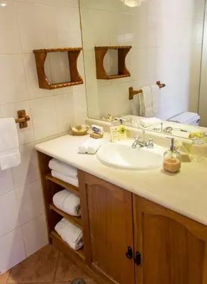 a bathroom with a sink and a mirror at Casa San Blas Cusco Boutique Hotel in Cusco