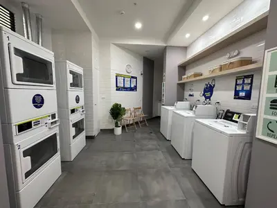 a kitchen with white appliances and white counters at 2BR 2BTH San Isidro Apartment in Lima
