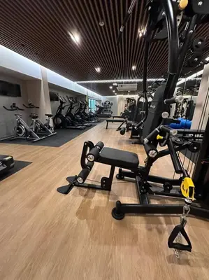 a gym with a bunch of exercise bikes in it at 2BR 2BTH San Isidro Apartment in Lima