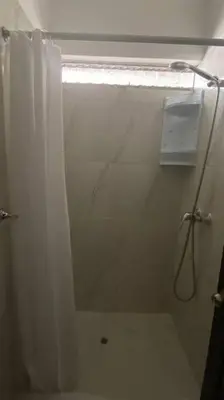 a bathroom with a shower with a shower curtain at (29) Dpto Nuevo y Acogedor Miraflores in Lima