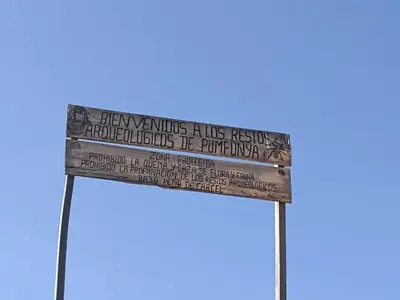 a sign that reads ply vanities rise against a blue sky at Casa del Virrey Hospedaje in Jauja